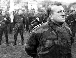 СРБИ И ДАЉЕ ЧЕКАЈУ ПРАВДУ, ДОК ТЕЧЕ ФАРСА ЗВАНА СУЂЕЊЕ ДУДАКОВИЋУ