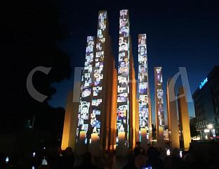 PORTRAITS OF FALLEN SOLDIERS AND FAMILY TESTIMONIES DISPLAYED ON THE CENTRAL MEMORIAL