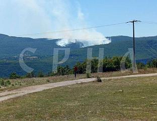 FIRE RAGES FOR THIRD DAY, MINEFIELD BURNING, AROUND 20 HOUSEHOLDS AT RISK