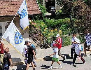 WHITE FLAGS WITH LILIES DISPLAYED DURING "MARCH OF PEACE"